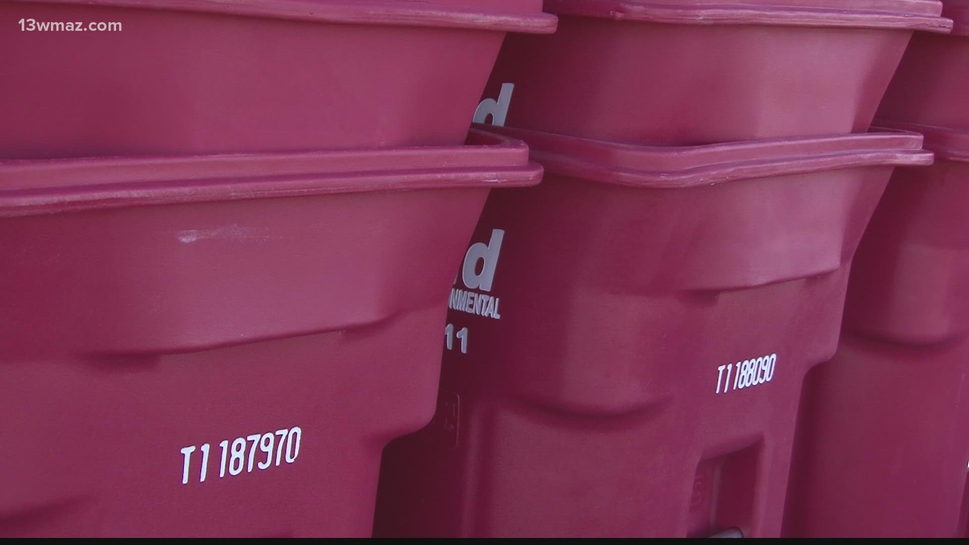 If you've driven past the old Macon Mall, you may notice there are thousands of trash bins in the parking lot. They're coming to your neighborhood.