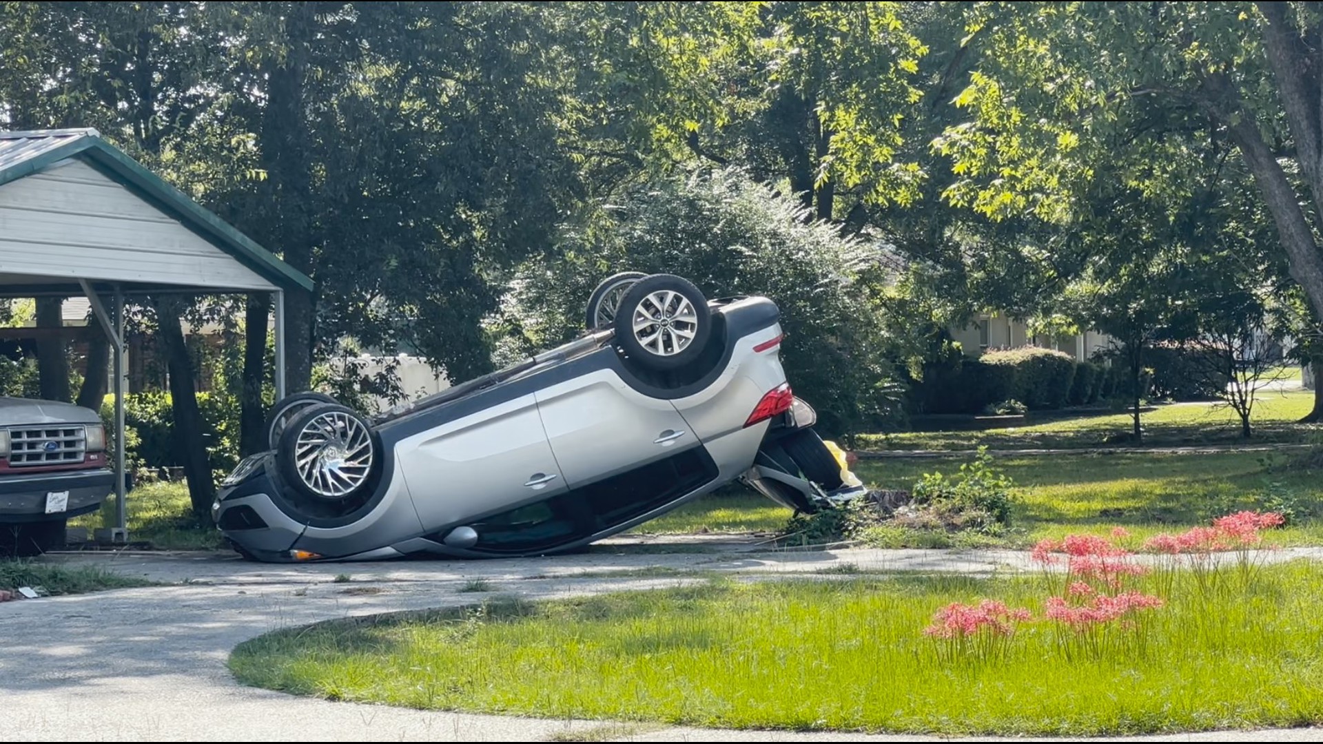 Law enforcement and firefighters were on the scene after an SUV flipped on Hartley Bridge Road.