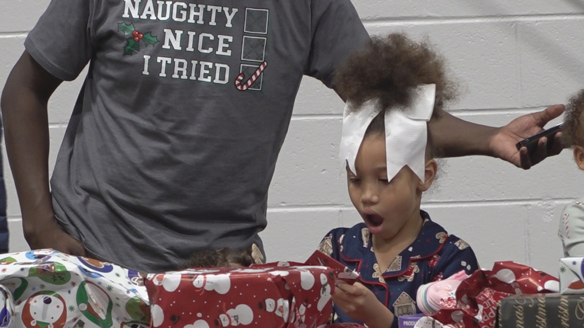 Houston County kids unwrap early Christmas gifts at 10th Annual giveaway