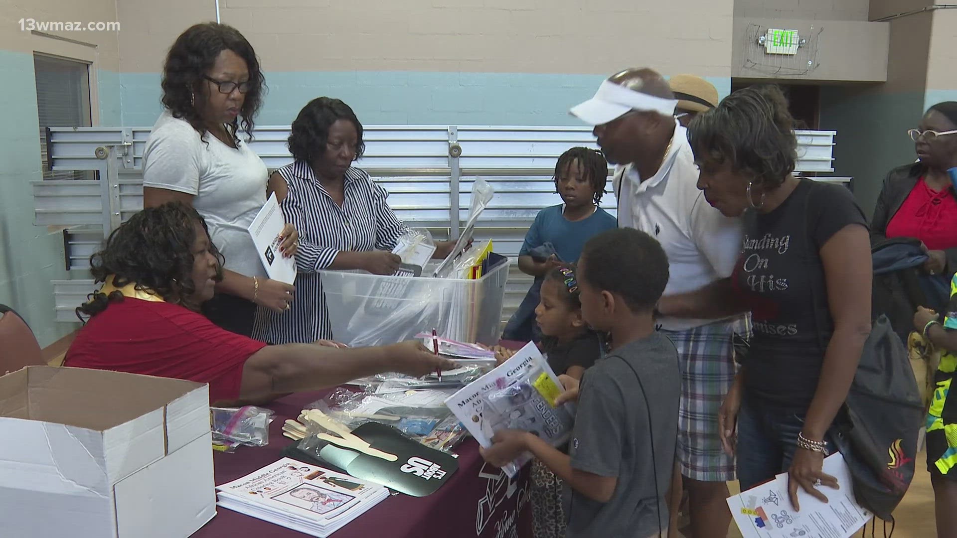 They gave out over 1200 book bags filled with folders, pencils, notebooks, crayons and other supplies.