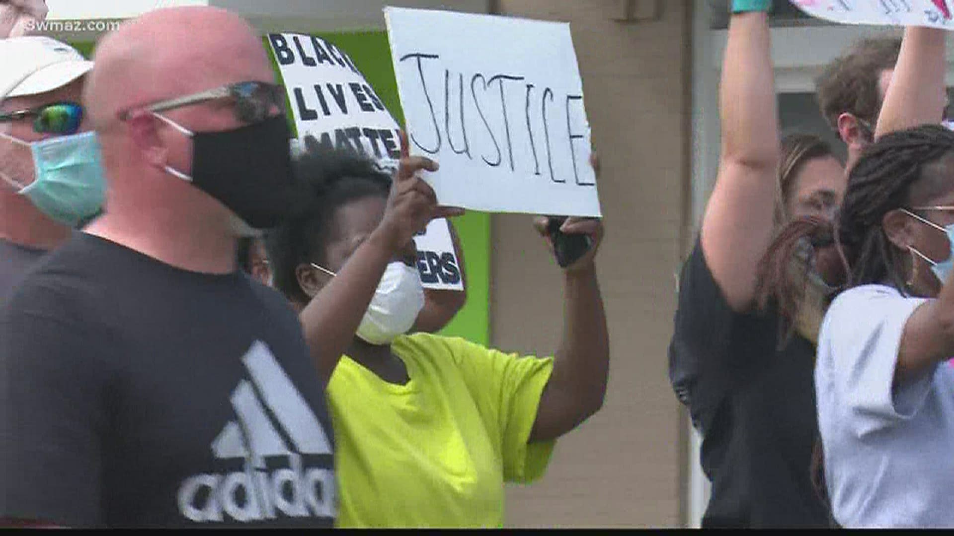 Protests continued in Central Georgia Friday as dozens of people came together for a peaceful protest in Cochran.