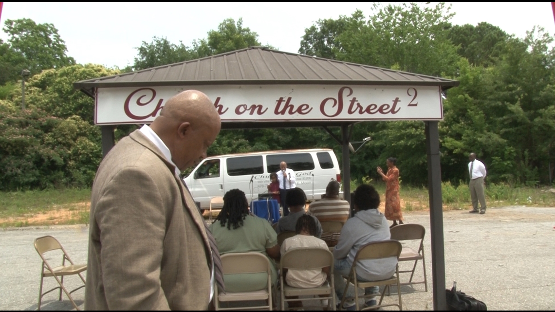 Macon pastor calls for end to violence at prayer for three young adults killed on Houston Avenue in 2022
