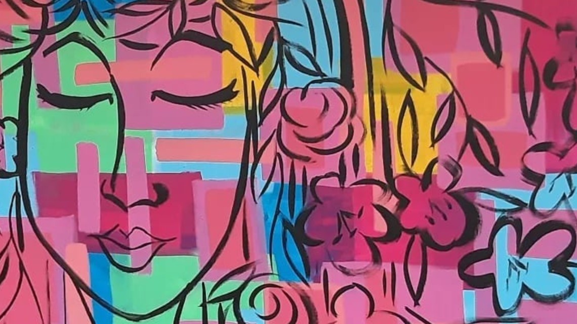 Macon artists creates mural for Cherry Blossom Festival | 13wmaz.com