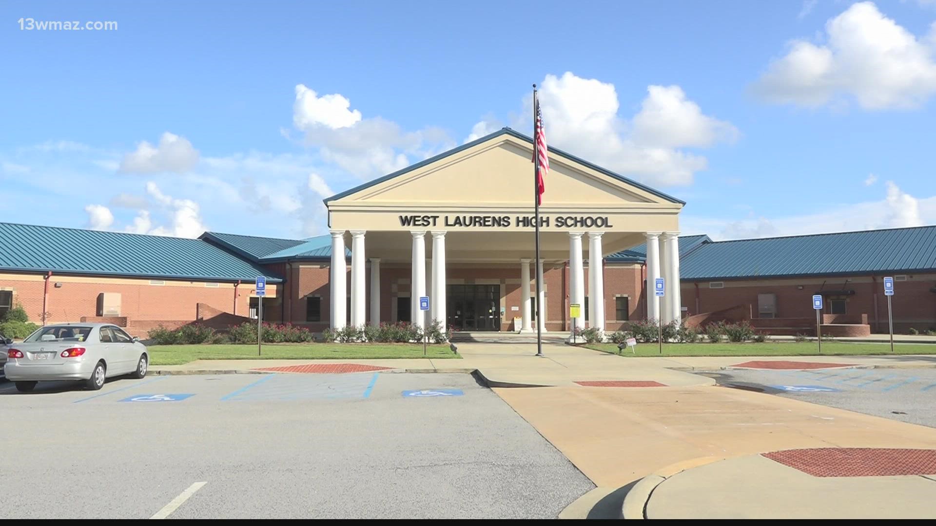 Laurens County School District says they were made aware of a threat written in the bathroom of either the West Laurens middle school and high school