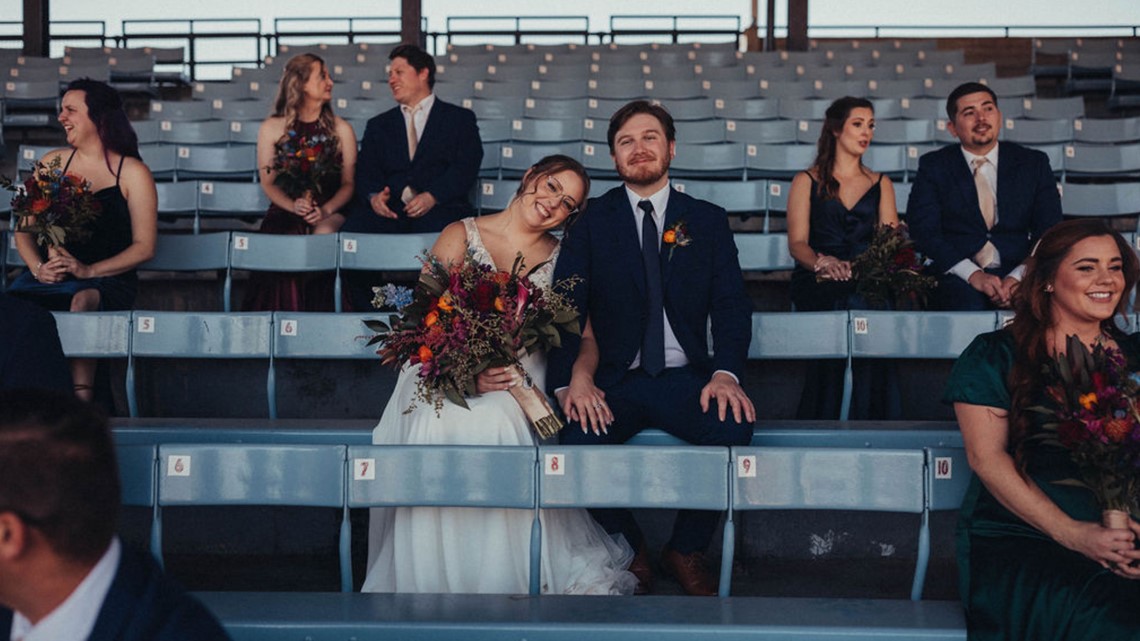 Macon couple gets married at Luther Williams field