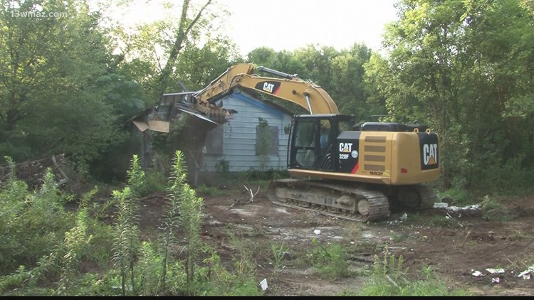 Just Curious: What's the process for tearing down a blighted building in Bibb County?