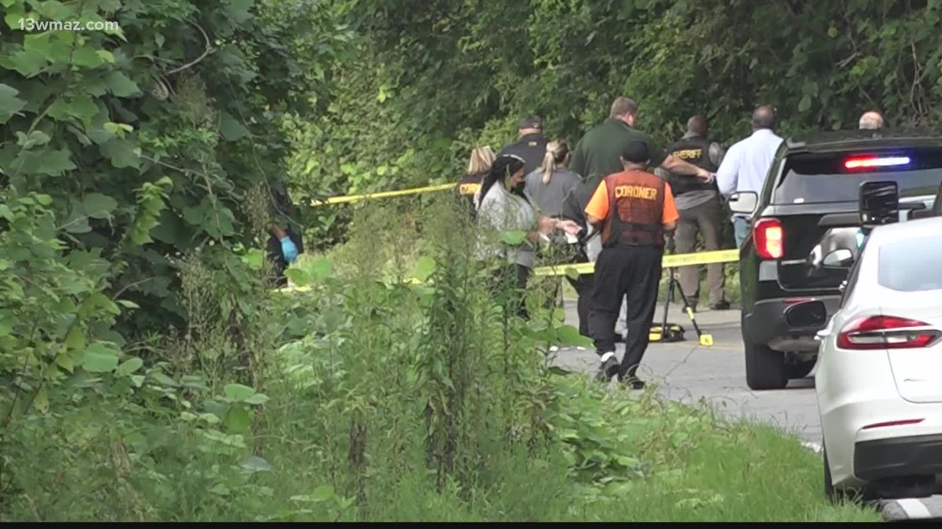 The 24-year-old woman was found on the side of the road with multiple gunshot wounds.