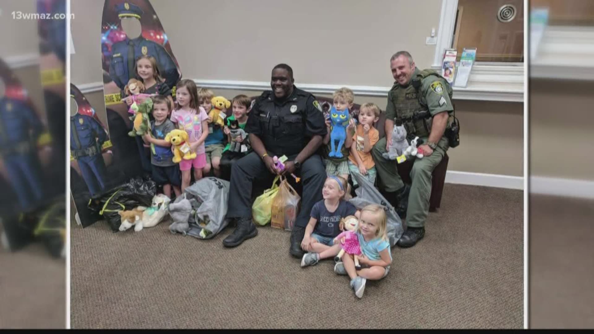 Students donate stuffed animals to Perry PD