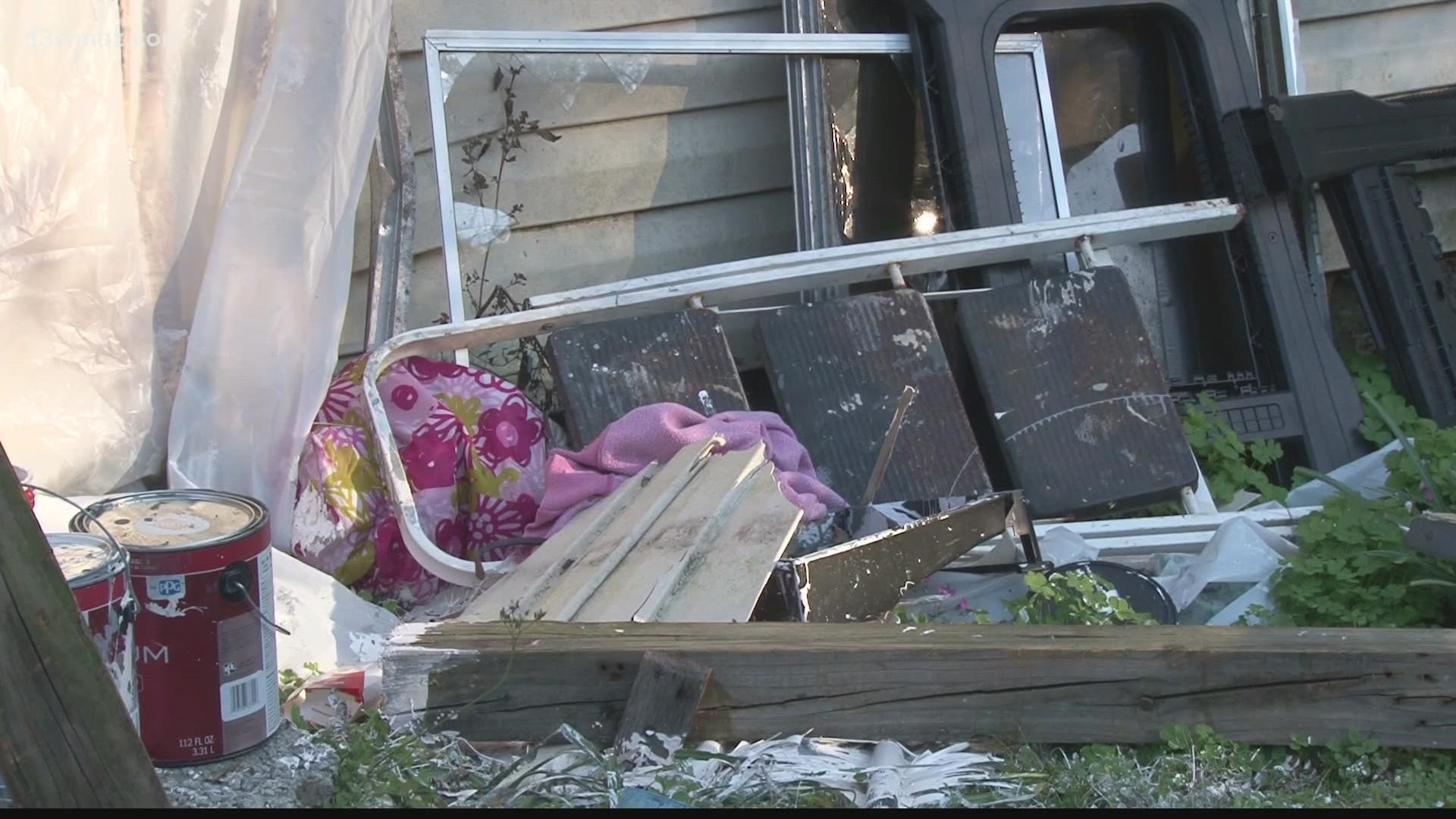 A Macon family is struggling to fix damage to their home after a driver who was shot crashed into it last week.