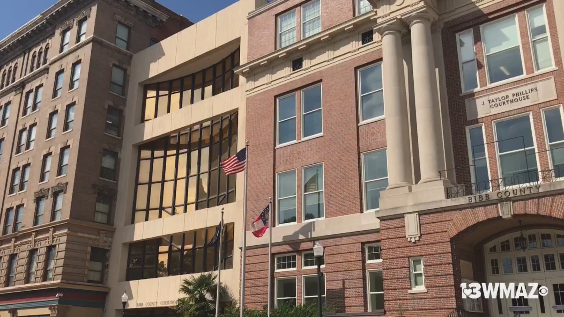 Bibb County commissioners approved spending $10,000 to draw up plans for a new parking deck in downtown Macon.