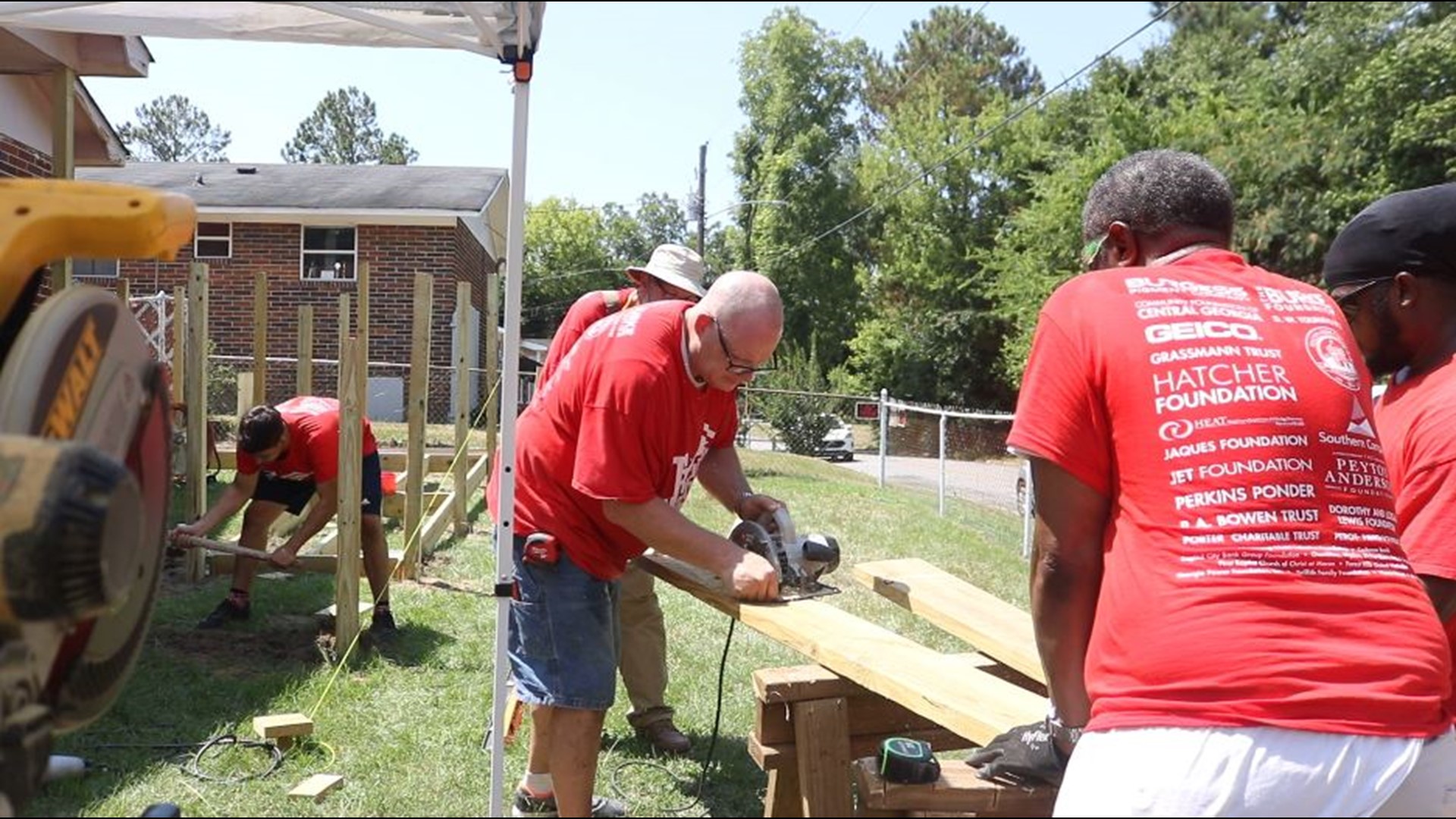 Volunteers haven't let COVID-19 stop them from improving Macon homes.
