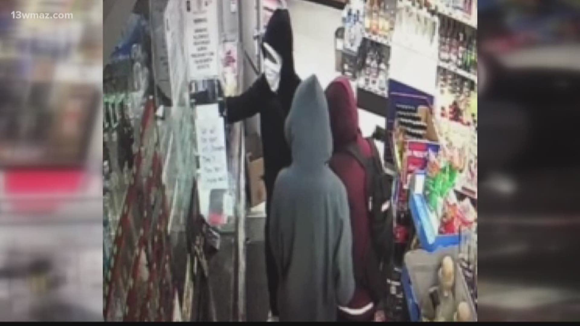 Bibb County deputies say three men robbed a Napier Avenue package store at gunpoint Saturday night.