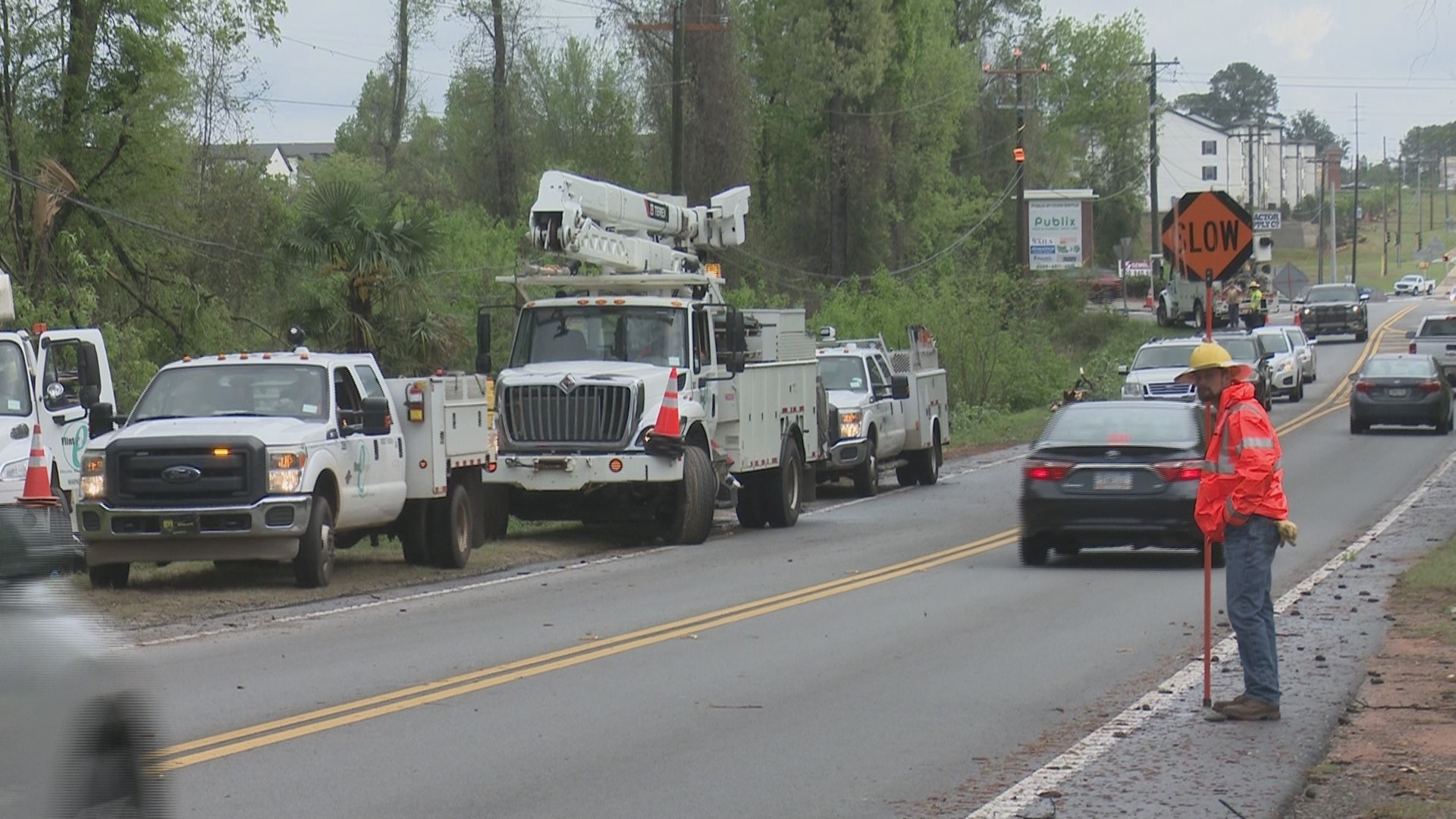 Flint Energies trucks throughout Highway 41 area after storm causes outages.