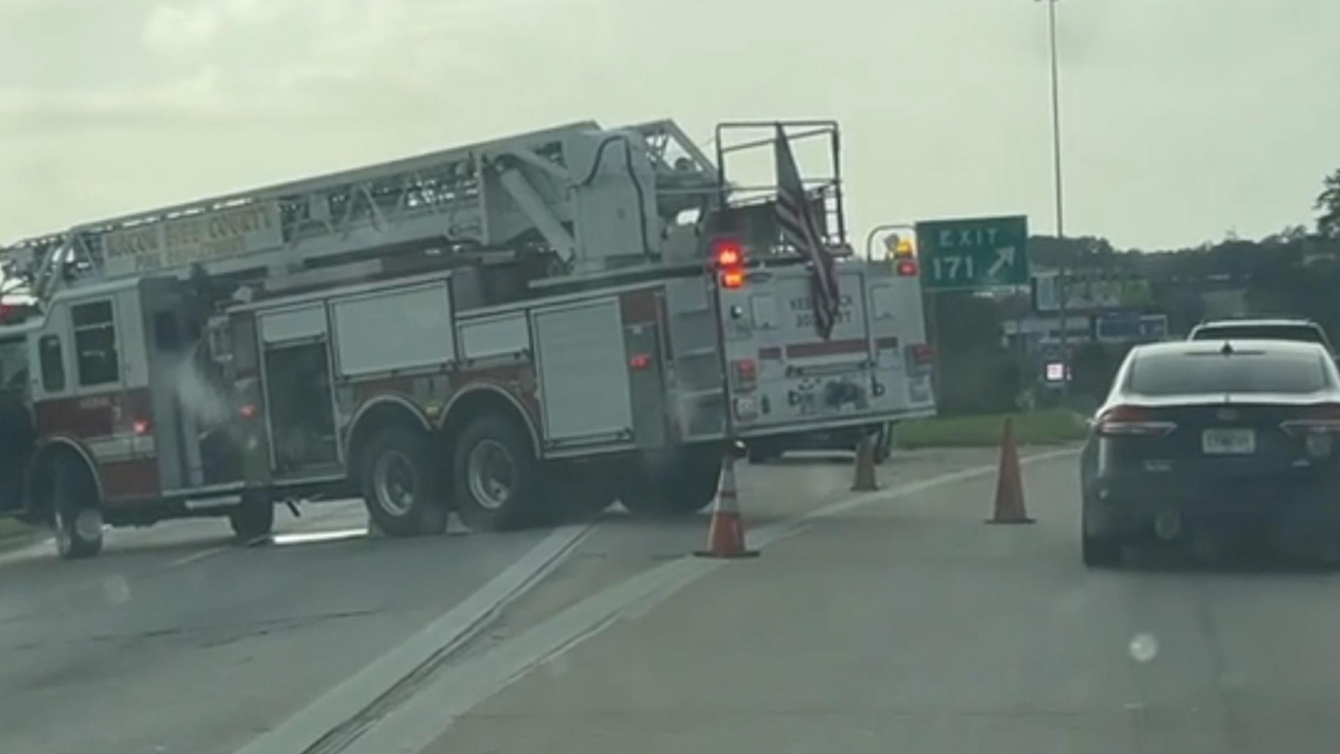 Emergency services are blocking off the Bass Road exit in Macon after an 18-wheeler crash.