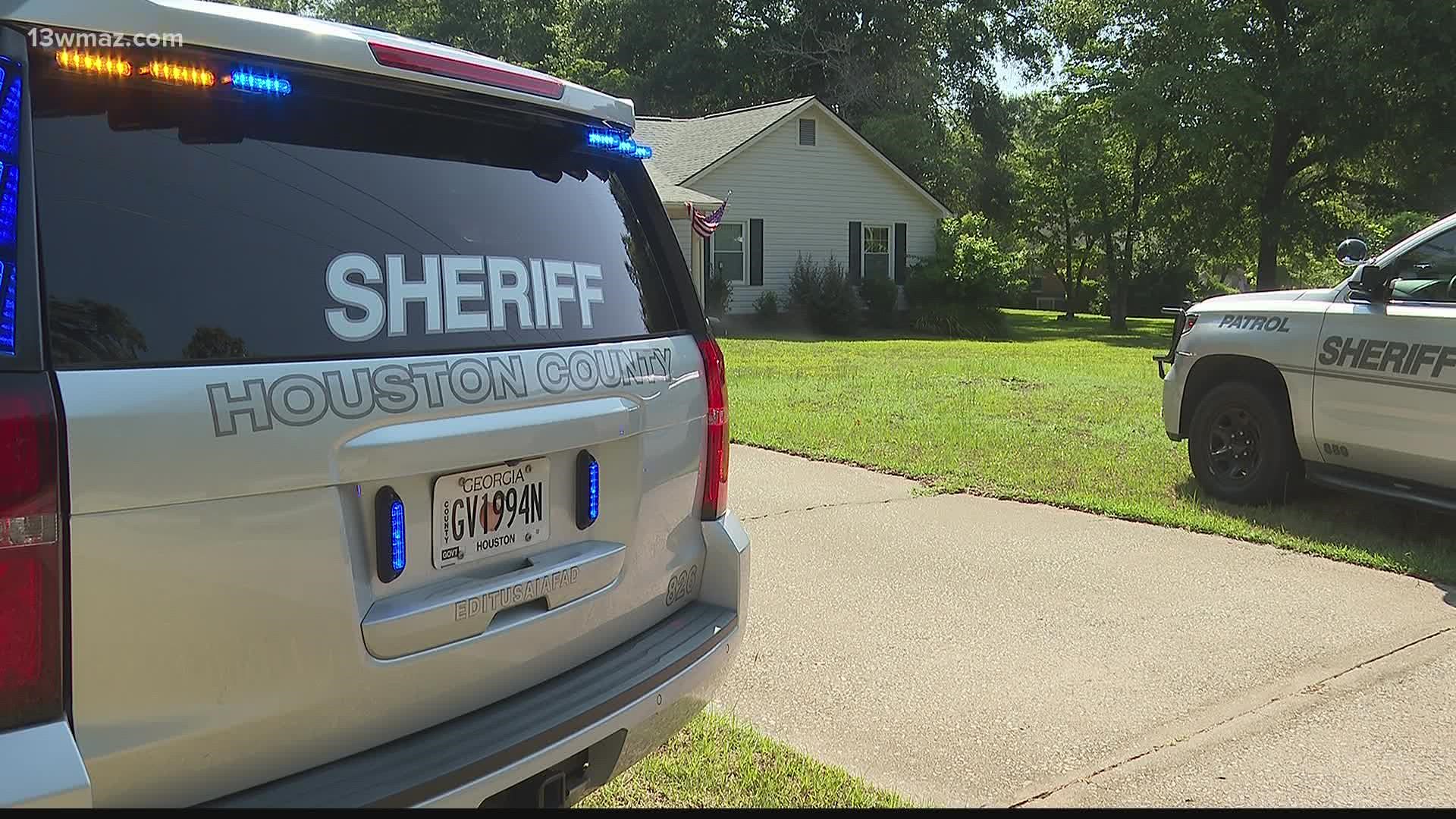 There were over 20 bullet holes in the front of the home, and more than 10 on the side of the home next door.