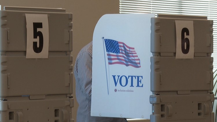 People in Bibb County cast their ballot in the 2022 senate runoff election
