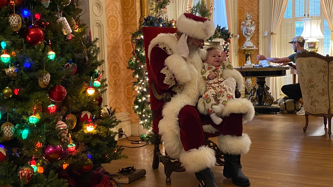 Kids get pictures with Santa during Hay House event