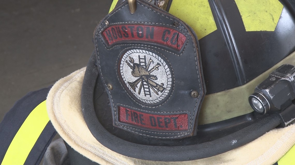 Houston County trash collection fees subsidy reversal funds 9 full-time fire department positions