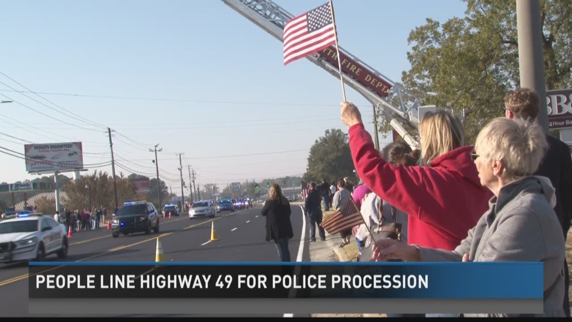 People line Highway 49 for Sondron procession