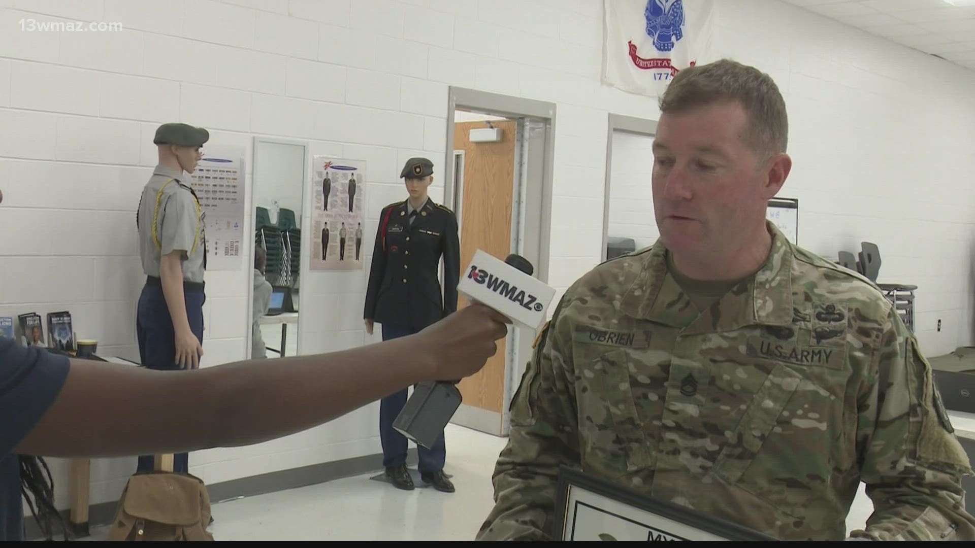 This week's top teacher has a love for serving his school and his country.