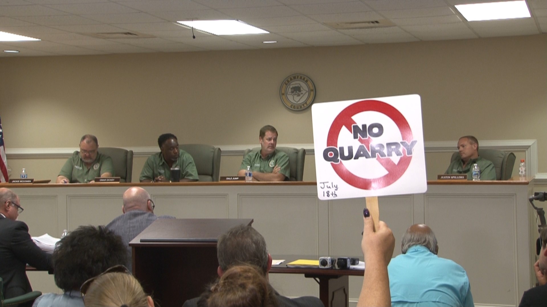 Hundreds flooded the courthouse Tuesday night, many of them opposing the 1,700-acre granite quarry.