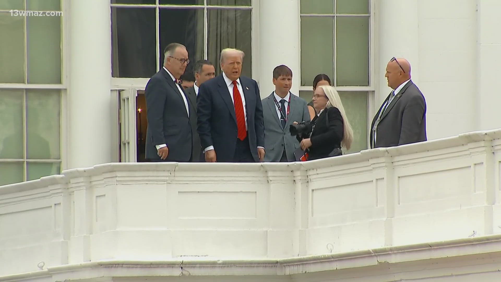Late Tuesday morning, Trump emerged from a door connected to the State Dining Room and stepped onto the roof above the press briefing room
