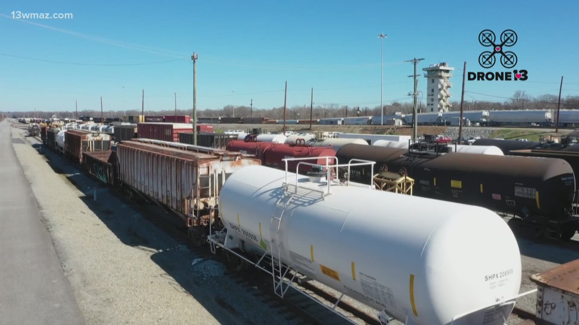 The rail yard workers help each other separate and build trains to head to at least six southeastern cities.