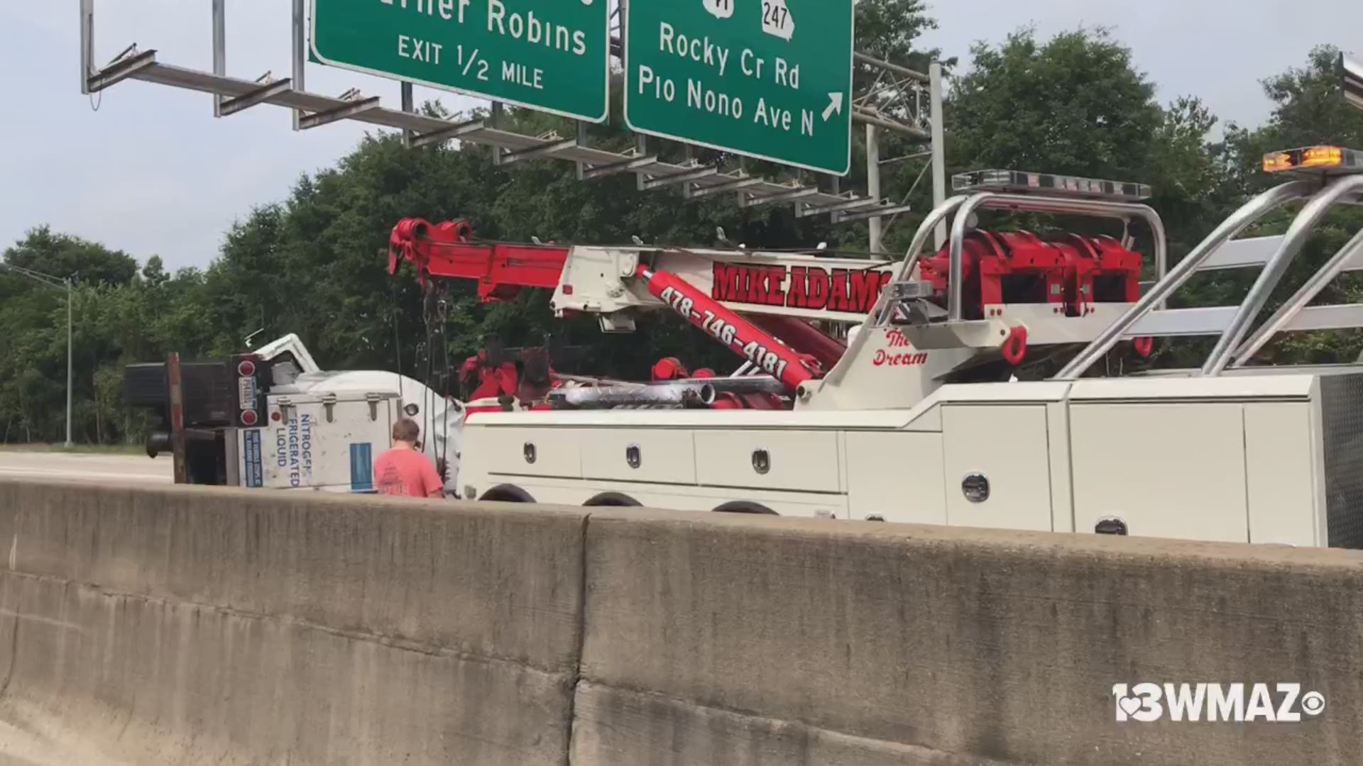 A tweet from the Georgia Department of Transportation says crews are working to clear an accident involving a tractor trailer and hazmat spill.
