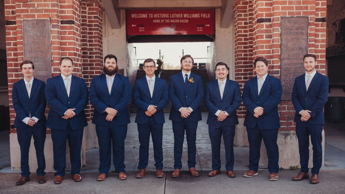 Macon couple gets married at Luther Williams field