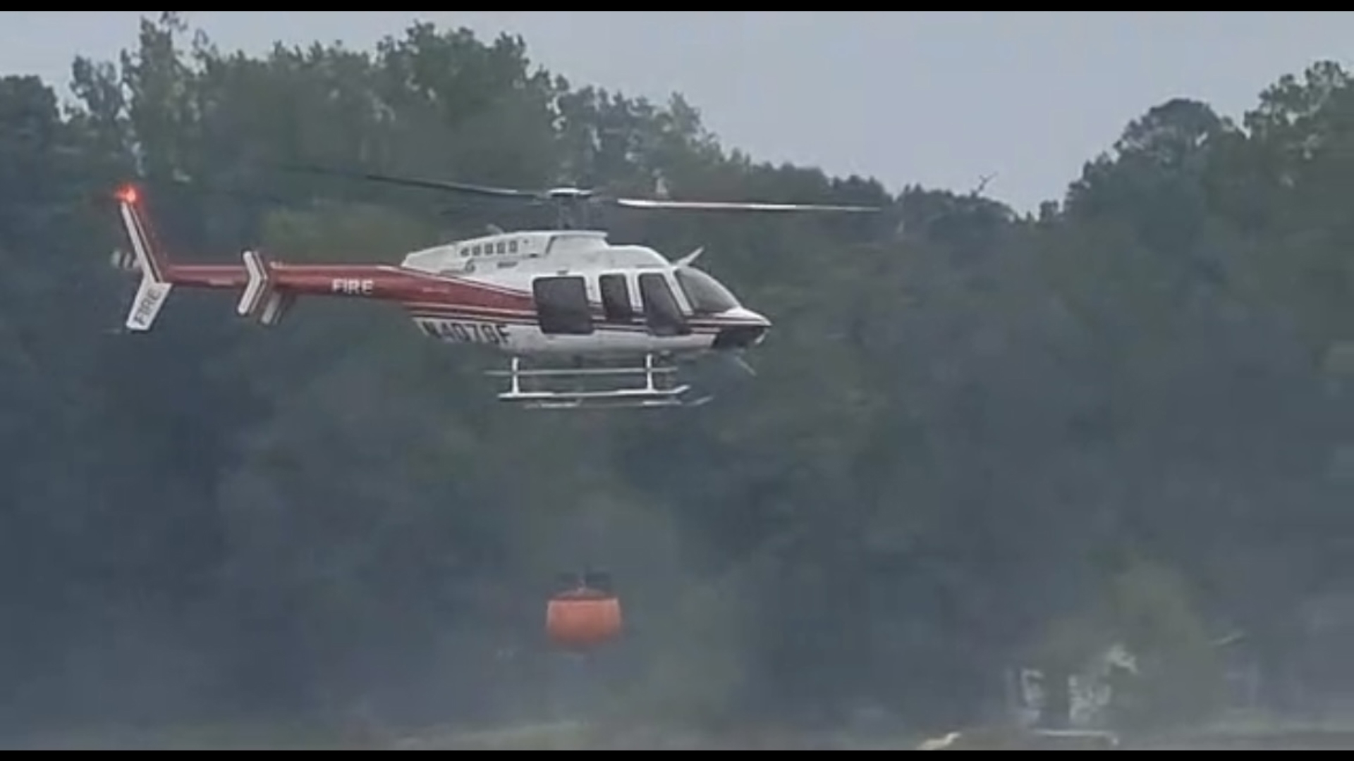 Viewer Craig Eddins shared this slow-motion video of a helicopter fighting a small tree fire.