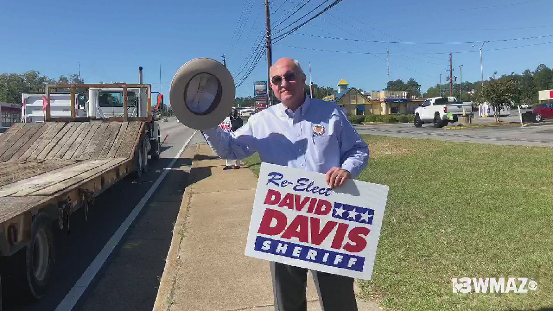 Sheriff Davis Davis was out waving at voters Tuesday as he seeks a third term in office. He faces a challenge this year from veteran GBI agent JT Ricketson.