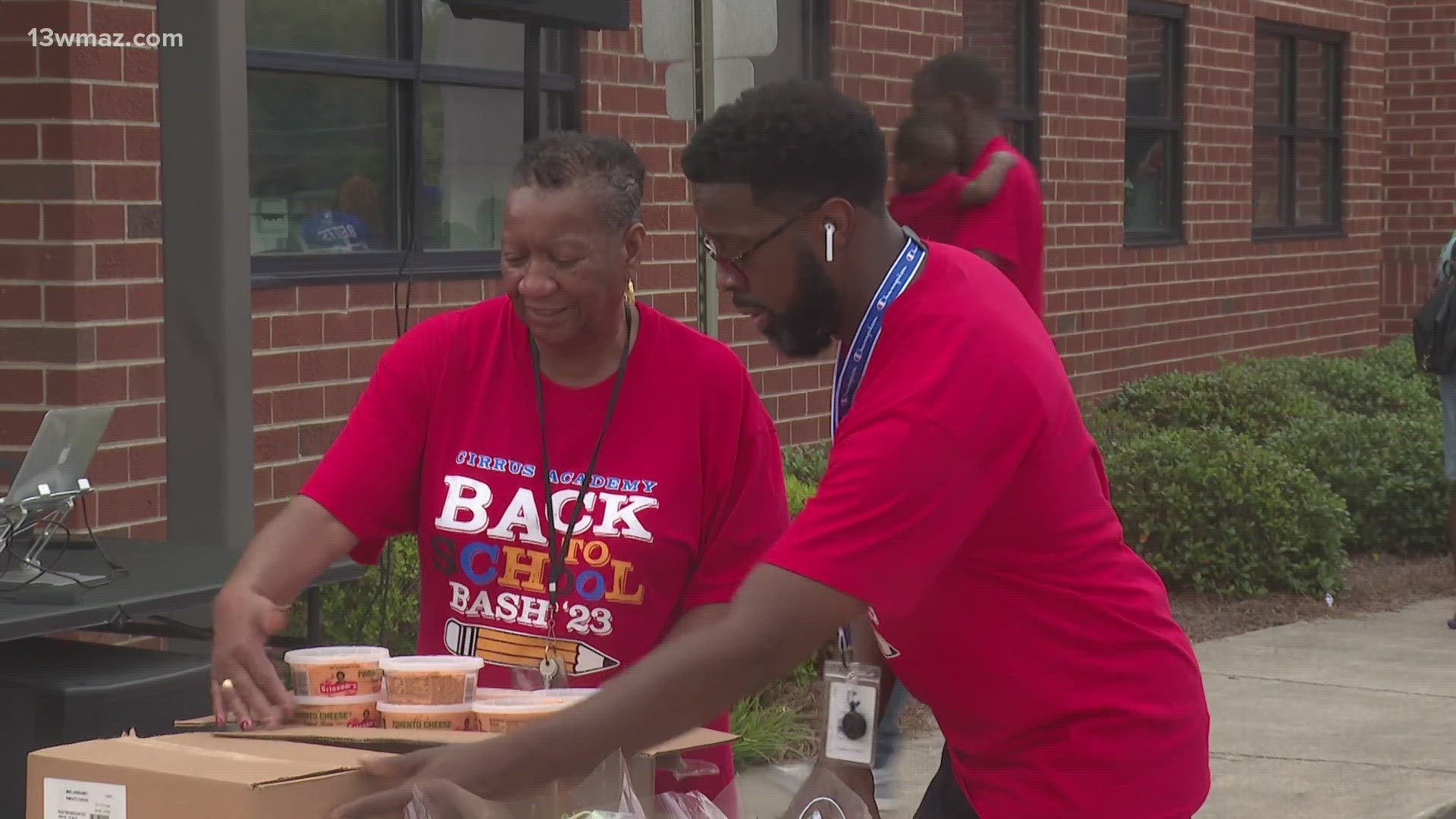 Students were given new backpacks, hair cuts, safety arm bands, and talk about any school year concerns.