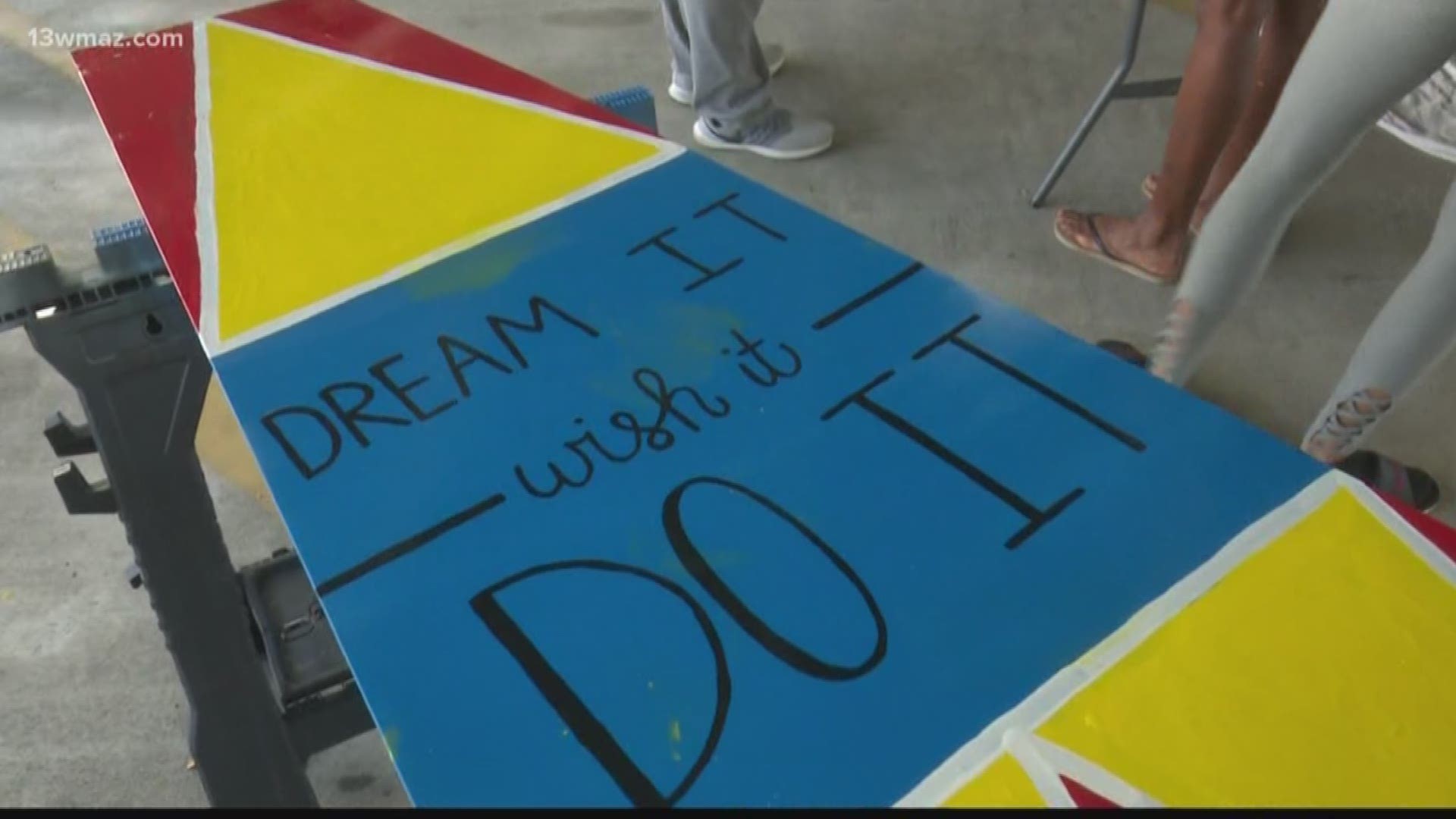 On Wednesday, children with the Mentor's Project STEM Camp painted a windmill to help give students a little boost for the new year.