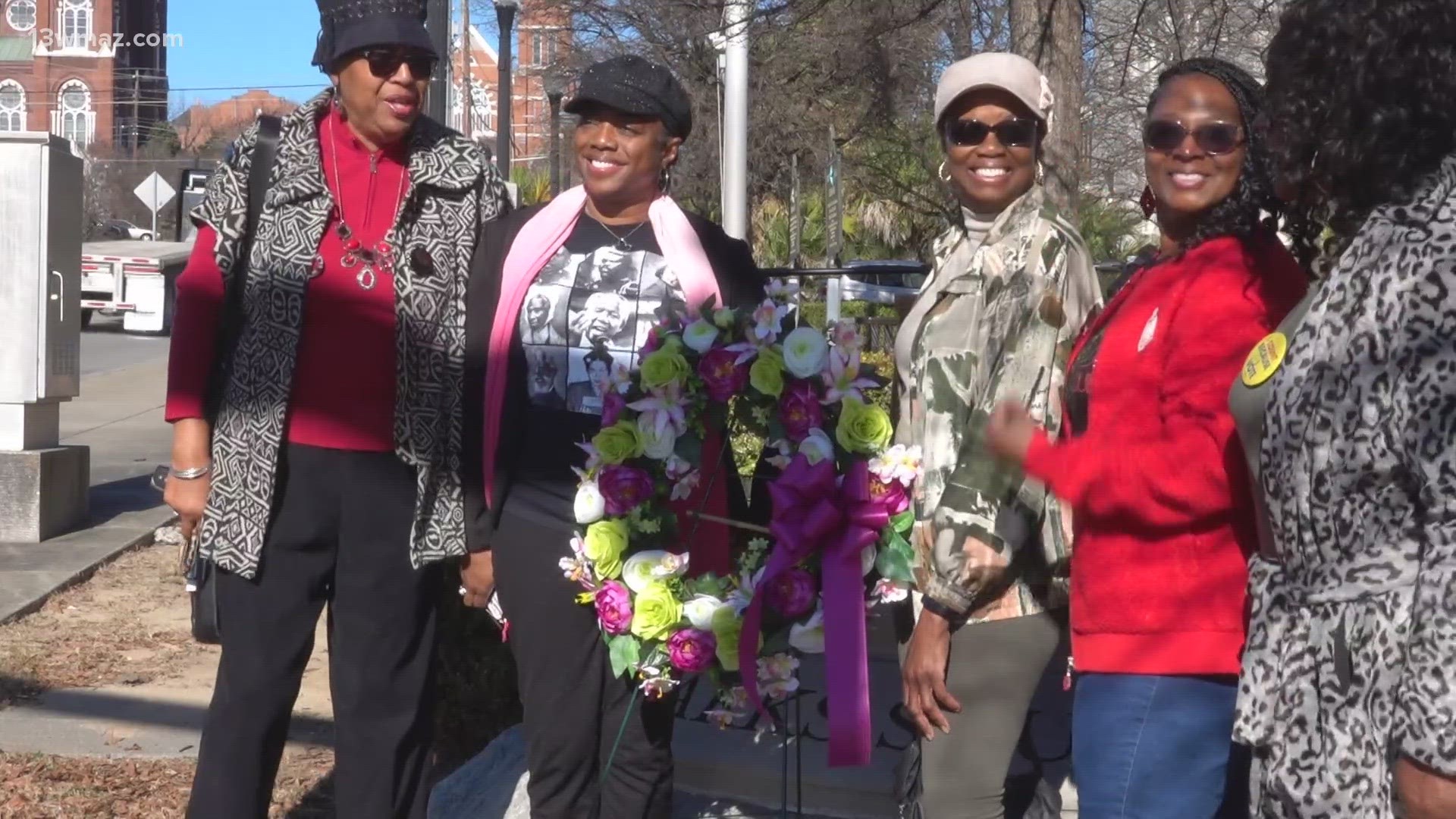 Community leaders and others gathered at Rosa Parks Square to watch the wreath being laid in her memory.