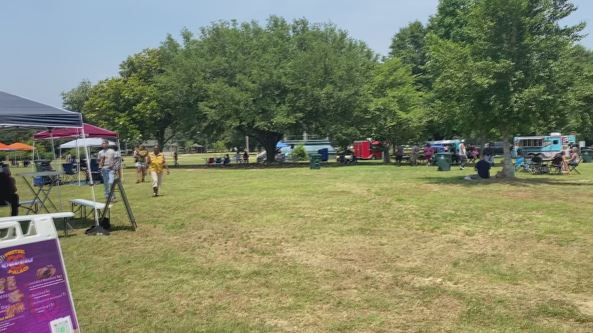 People walked around the park and visited various food trucks, drink stands, and vendors.