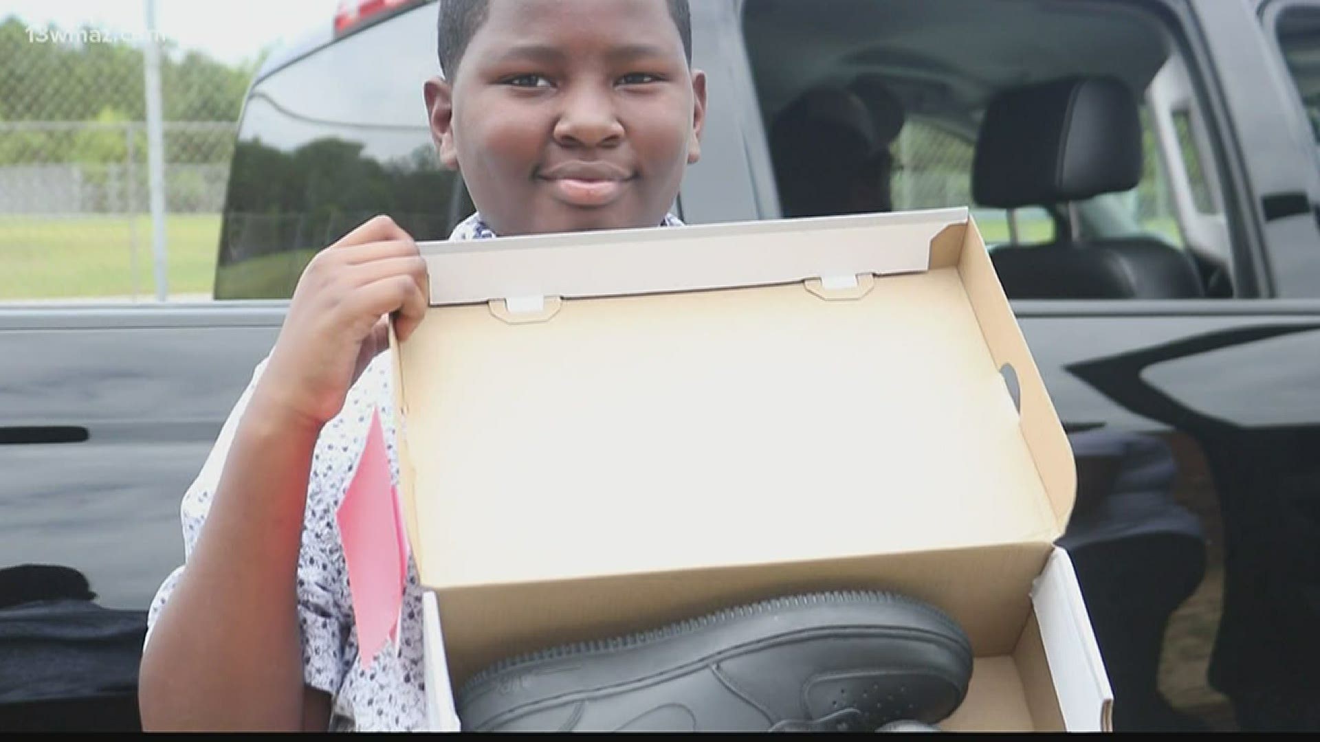 Harvest Builders Worship Center partnered with Fresh Sneaker Boutique to give students free sneakers