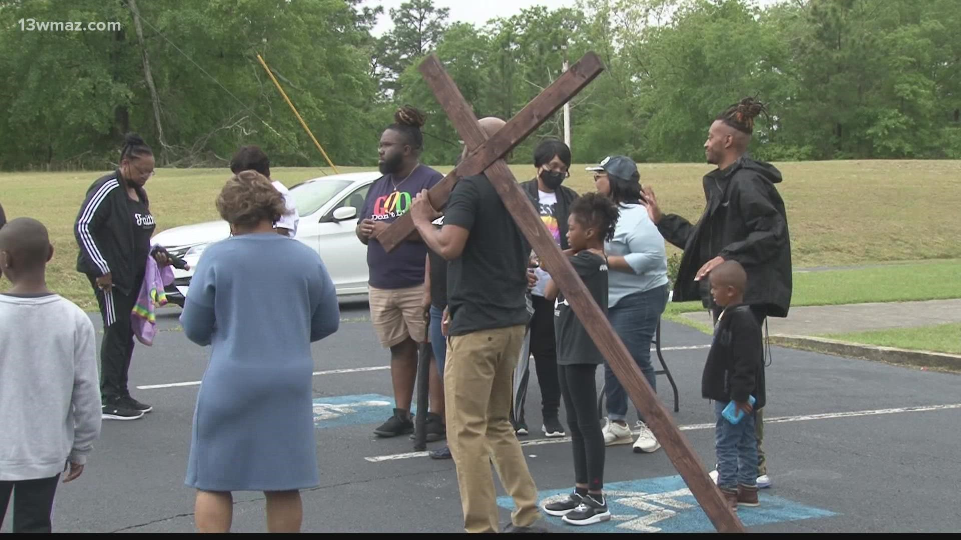 Participants received their own cross to carry during a two mile walk.