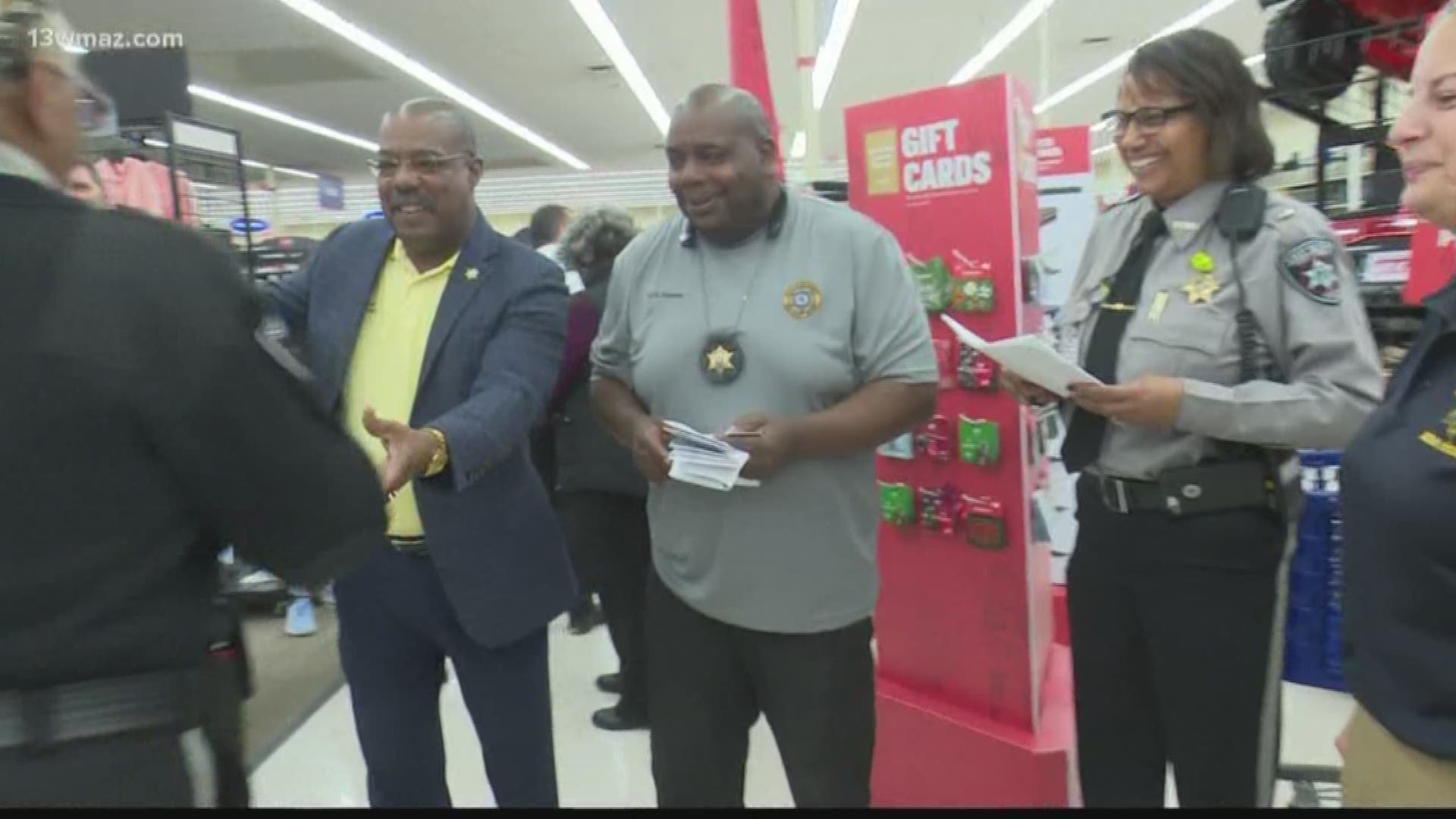 Academy Sports and Outdoors partnered with the Bibb County Sheriff's Office to bring 18 local first responders and their families on a special holiday shopping spree