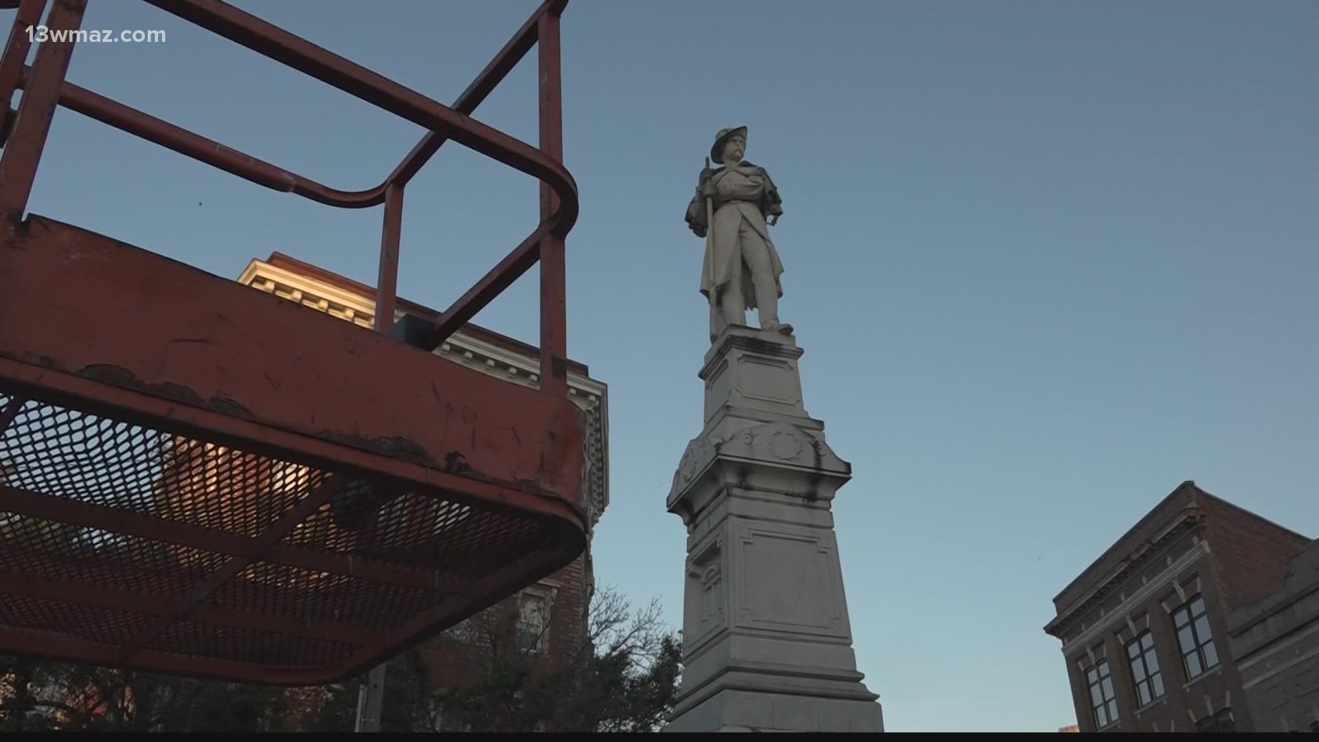 A Macon man stayed the night at the Confederate statue on Cotton Avenue in protest of it being moved on Wednesday.