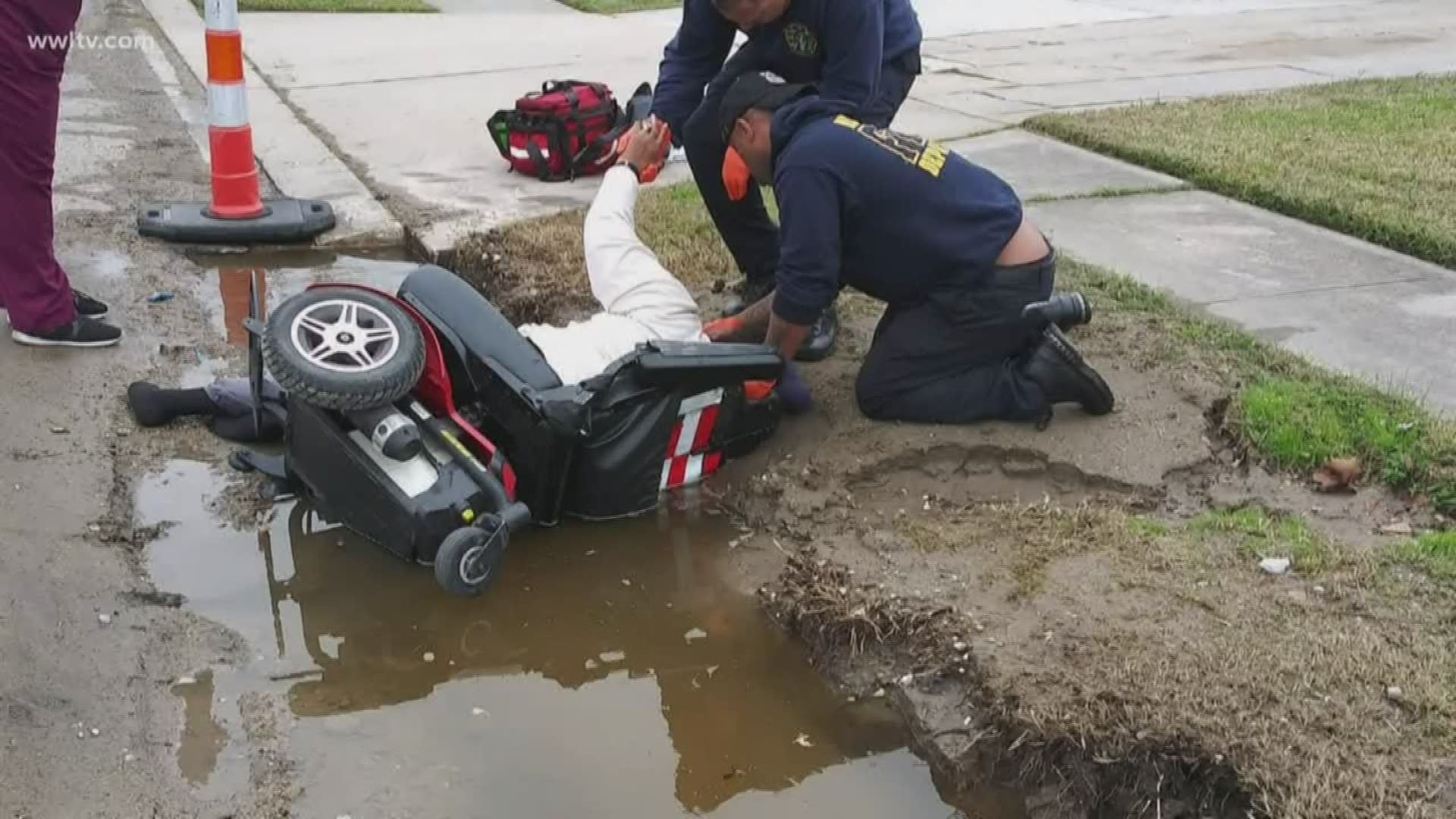 A woman in her seventies is recovering after her wheelchair tipped over into a huge hole in a New Orleans street.