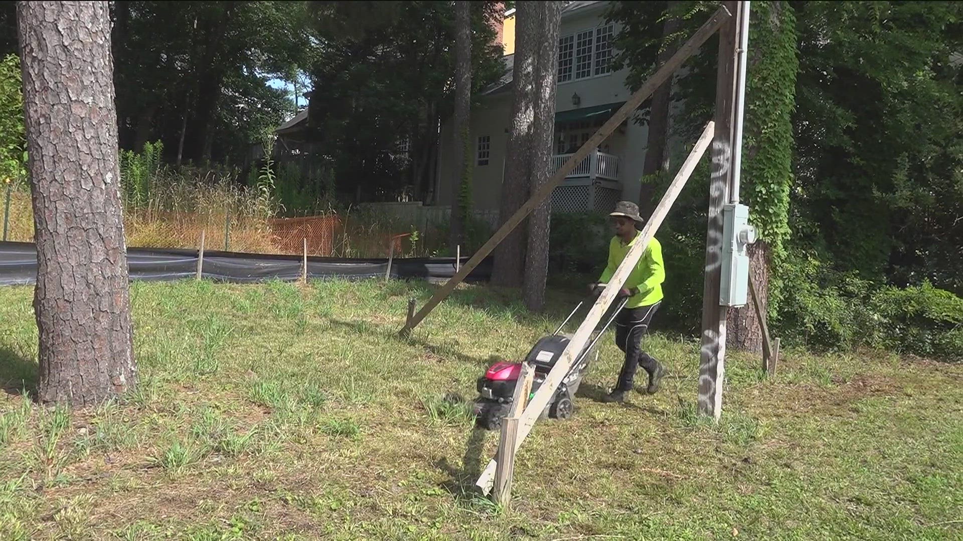 A couple making their mark on the community mowing dozens of overgrown and abandoned lots for free is now asking the public's help.