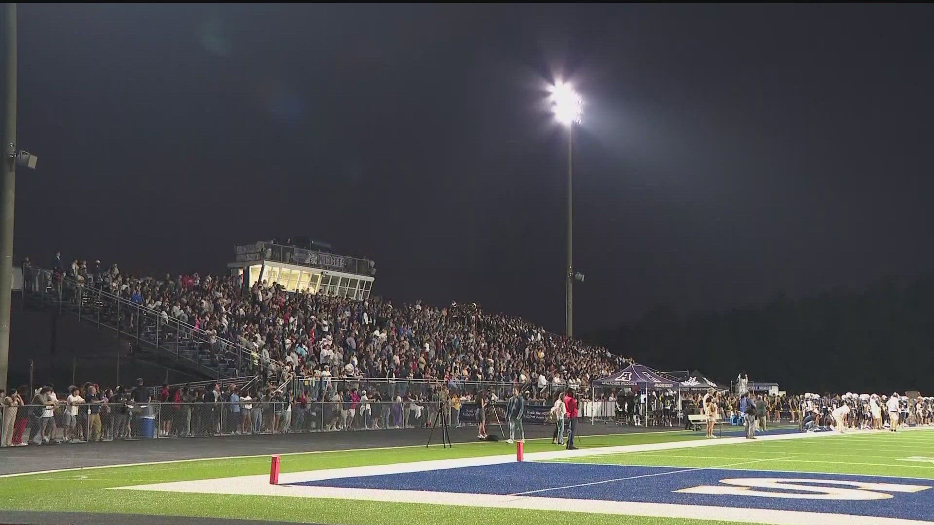 A grieving community came together on Friday night at Apalachee High School -- exactly one month after a deadly school shooting struck tragedy in the hearts of many.