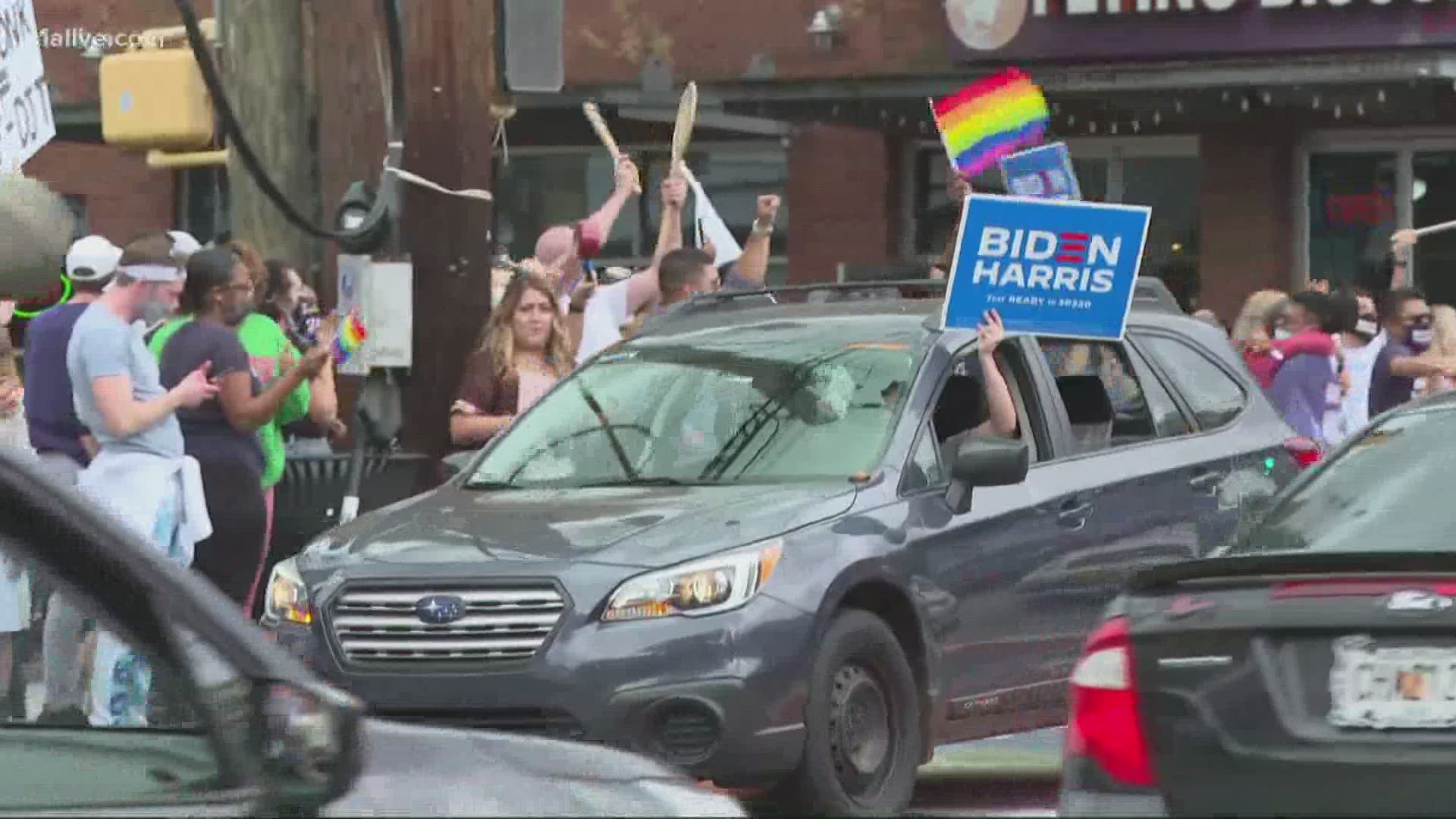 People are gathered in Midtown Atlanta to celebrate the presidential race being called for President-elect Joe Biden and Vice President-elect Kamala Harris.