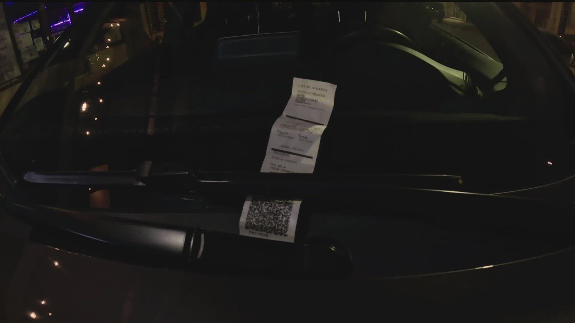 One woman is putting the scammers on notice in order to help prevent others from being scammed by bogus parking tickets.