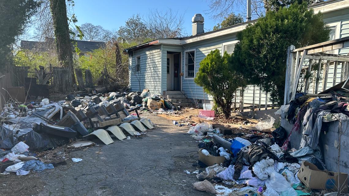 'It's disgusting' | Rats, squatters, and mounds of trash at vacant home causes issues for neighborhood