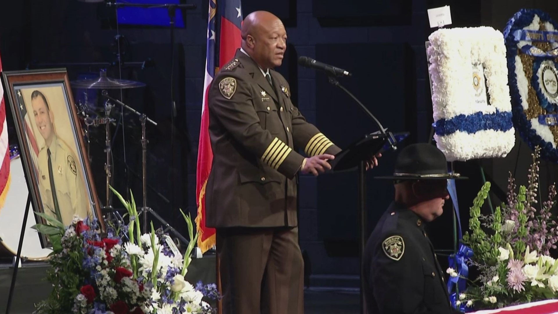 Cobb County Sheriff Craig D. Owens, Sr. speaks during the funeral for Deputy Jonathan Koleski.