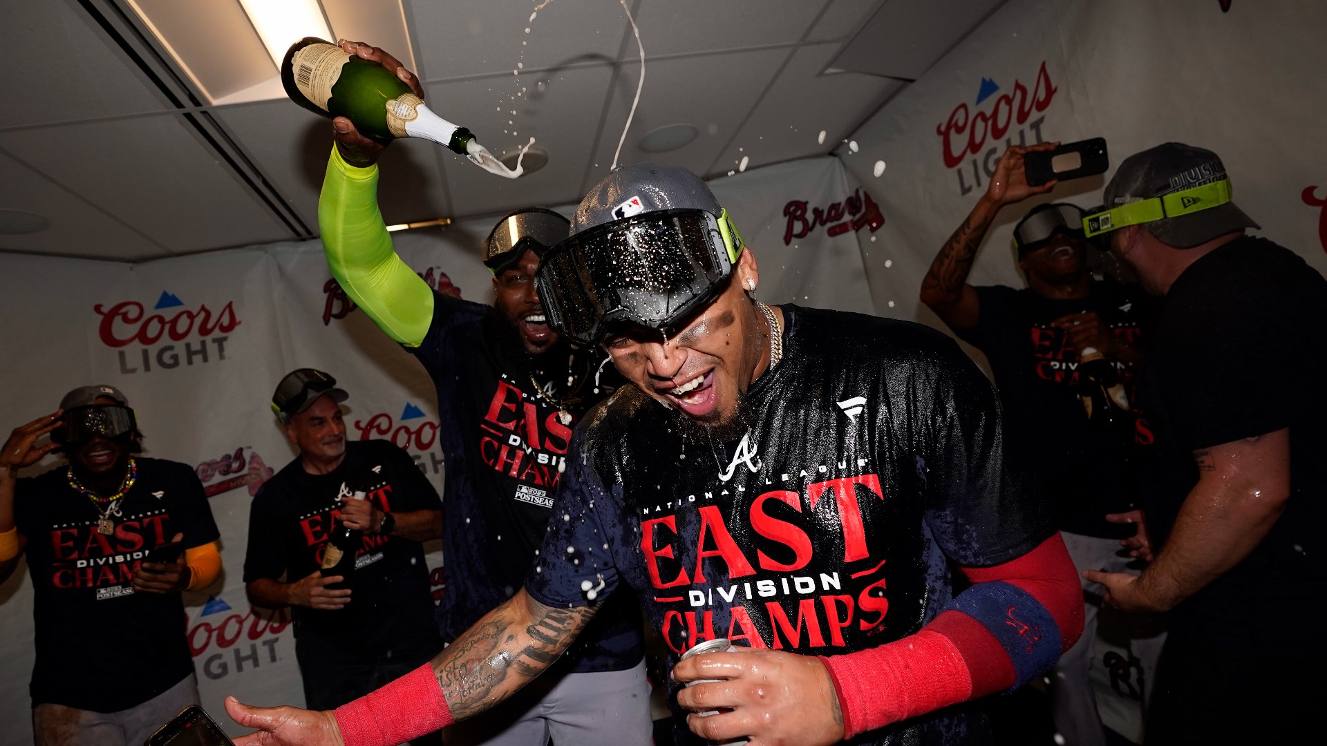The champagne was on deck after the Braves beat the Phillies 4-1 to clinch the NL East title.