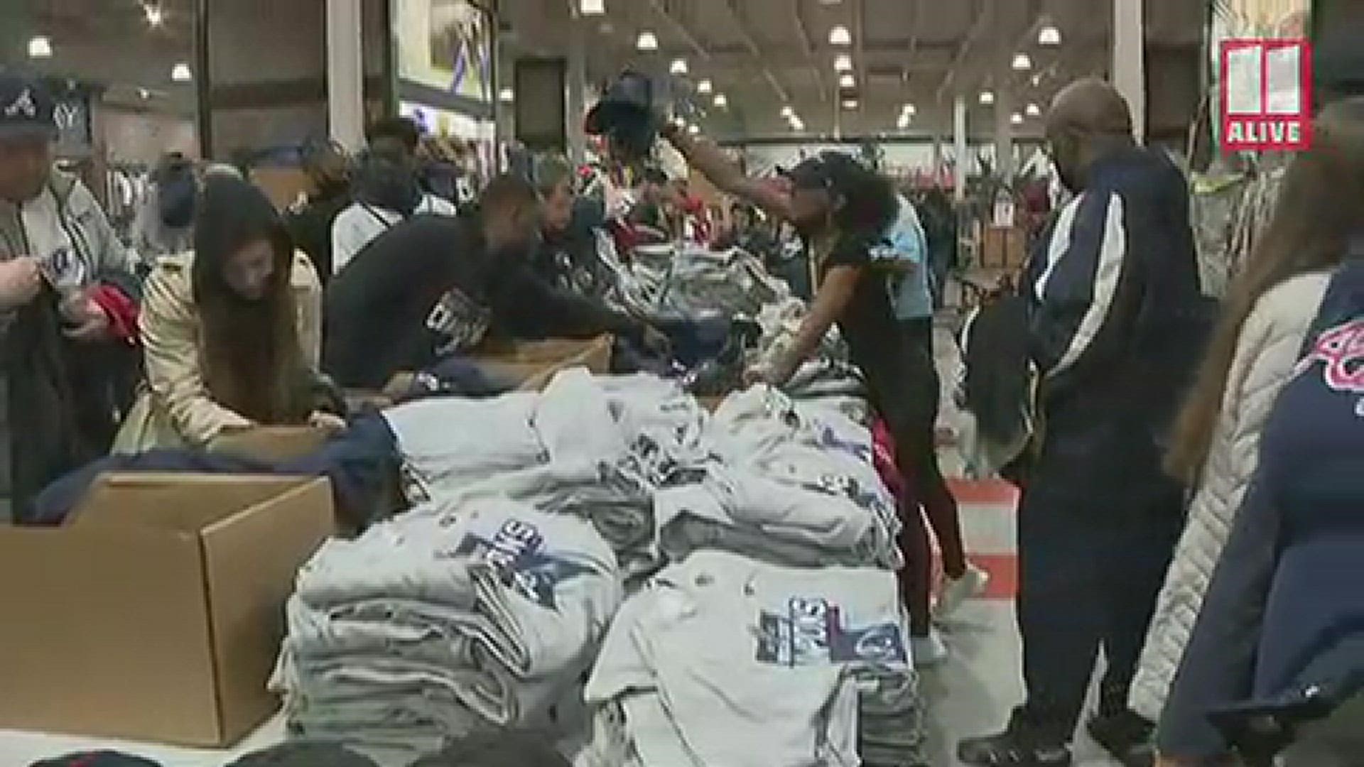 Our photojournalists saw the madhouse at Dick's Sporting Goods after the Braves won the World Series.