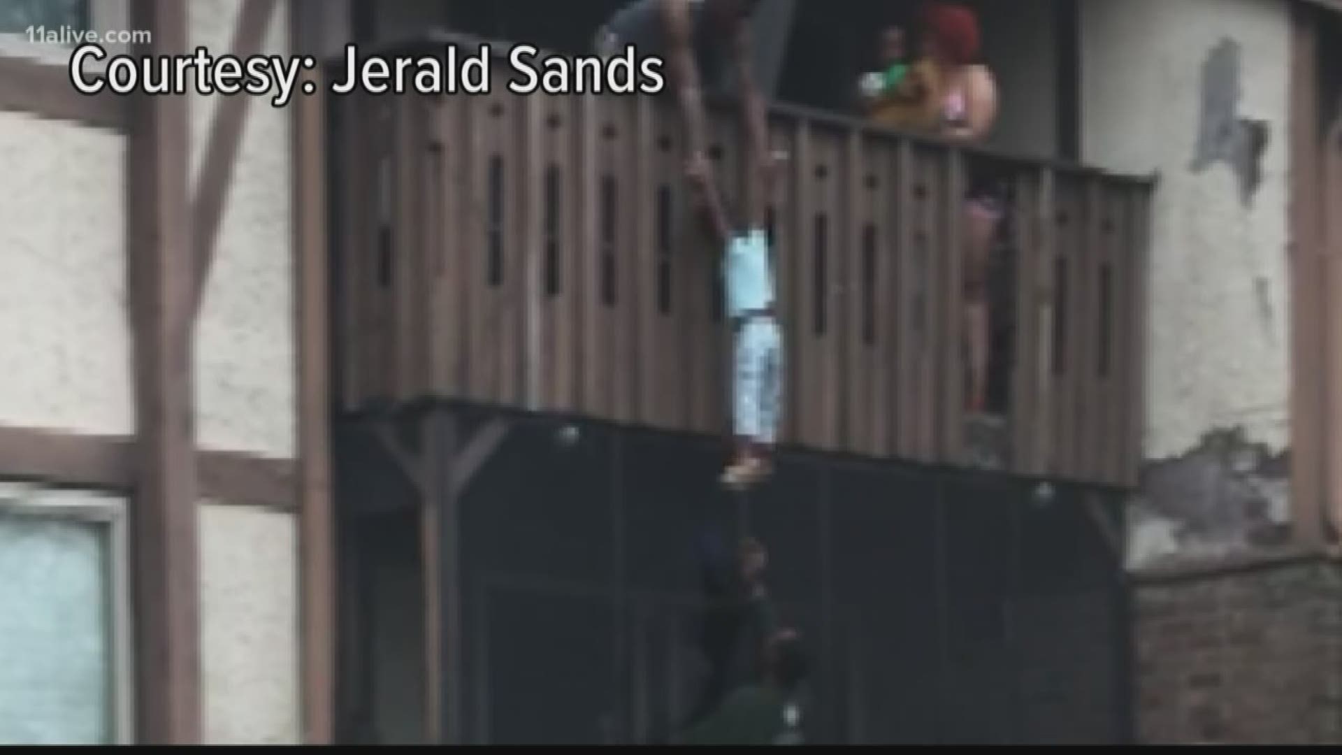 Video shows people jumping in to help.