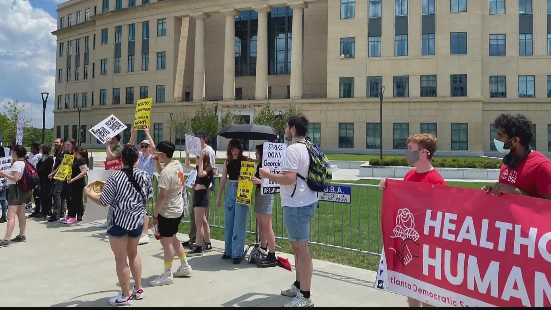 Their fliers said they want Georgia's attorney general to "strike down the GA heartbeat ban."